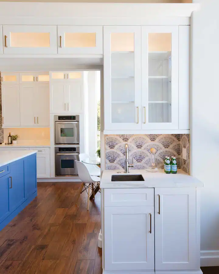 A kitchen with a wood floor