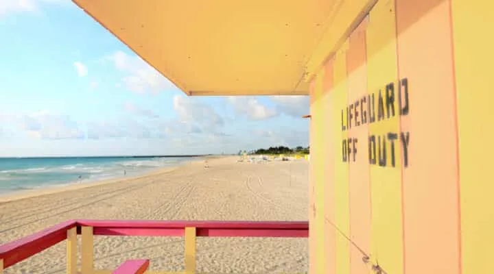 A sign on a beach