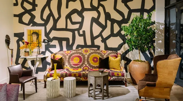A living room filled with furniture and a table