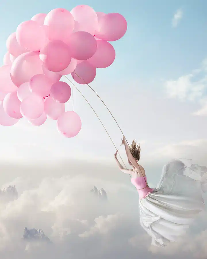 A group of people flying kites in the sky