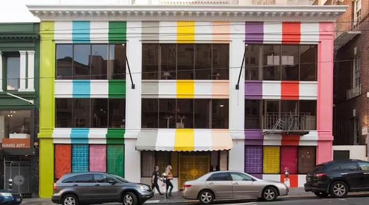 A car parked in front of a building