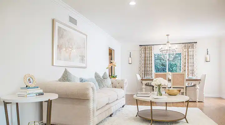 A living room filled with furniture and a fire place