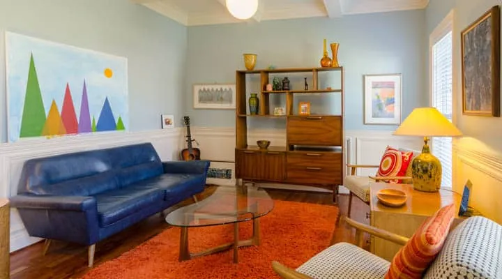 A living room filled with furniture and a fireplace