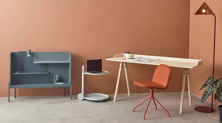 A chair sitting in front of a desk