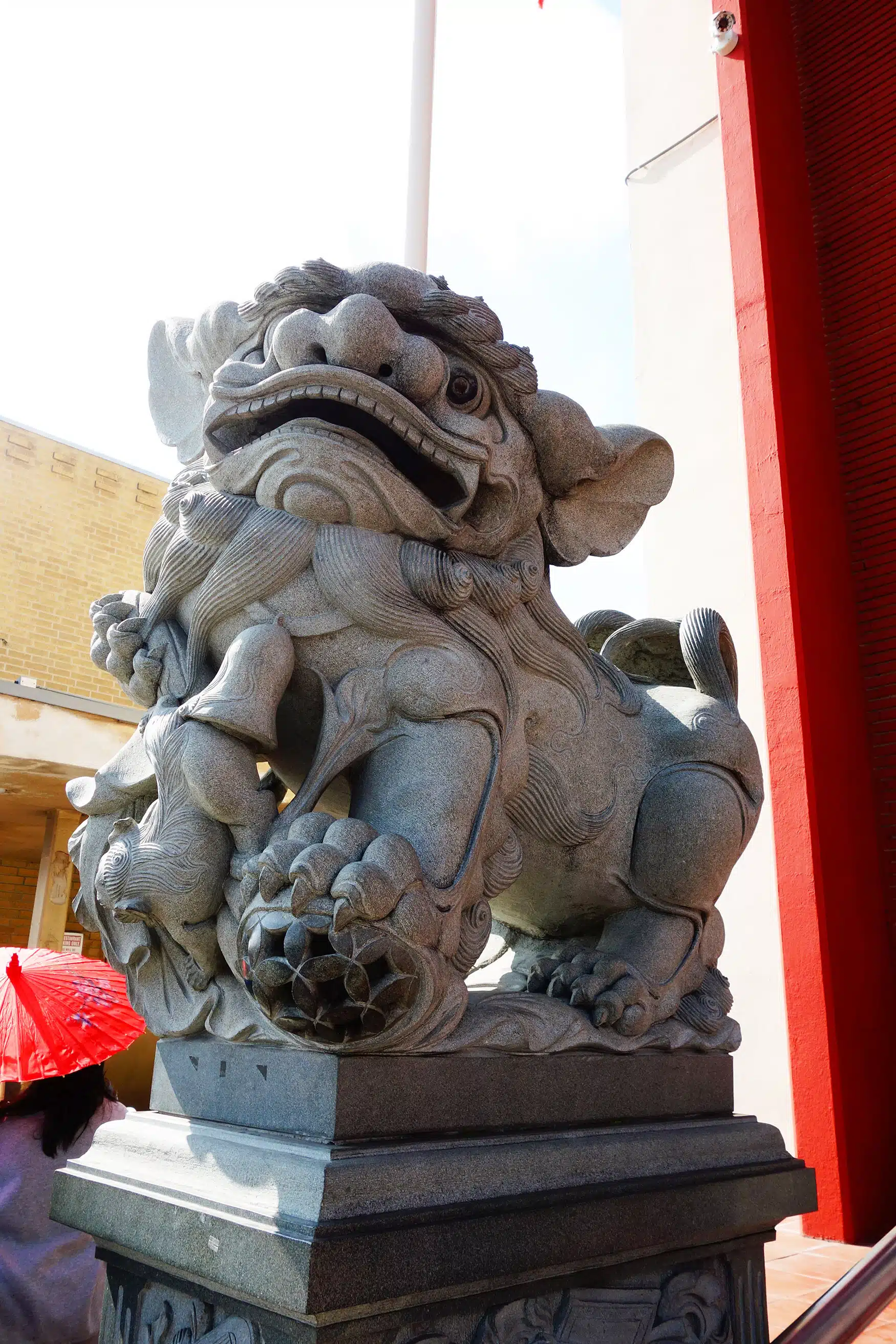 A group of stuffed animals sitting on top of a building