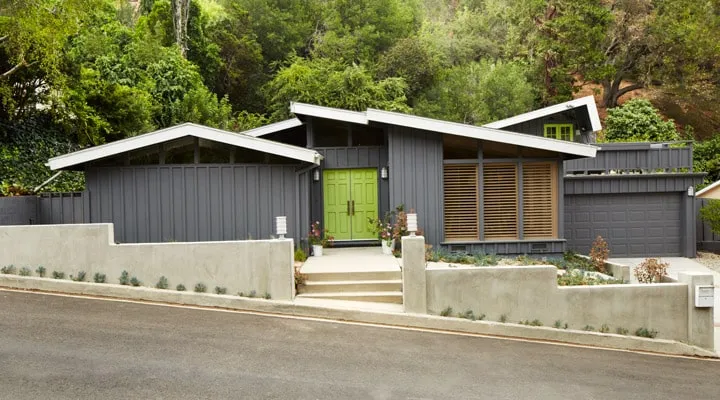 A house with trees in the background