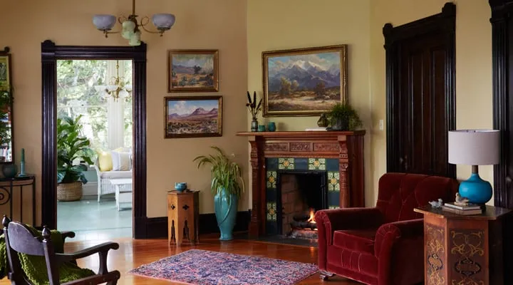 A living room filled with furniture and a fire place