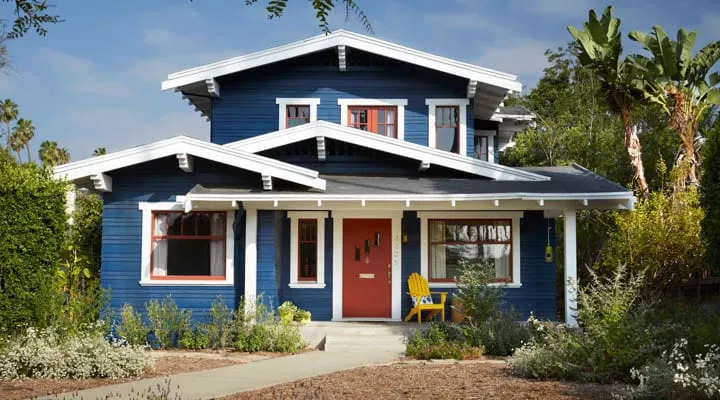 A small house in front of a building