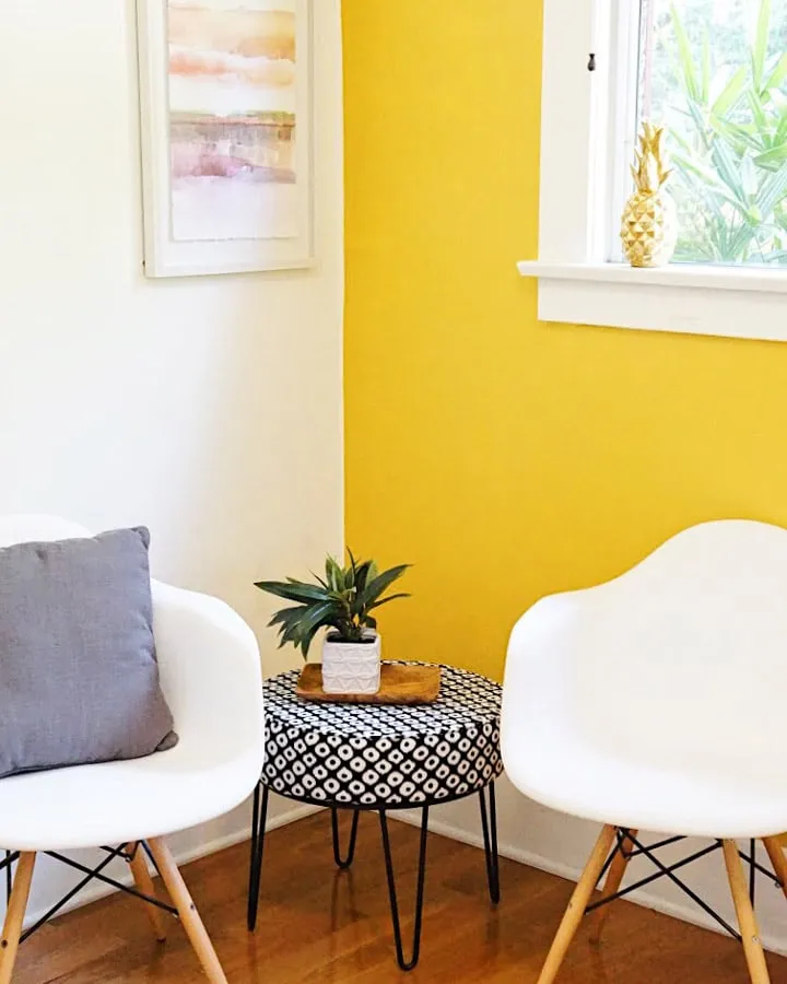 A living room filled with furniture and a table