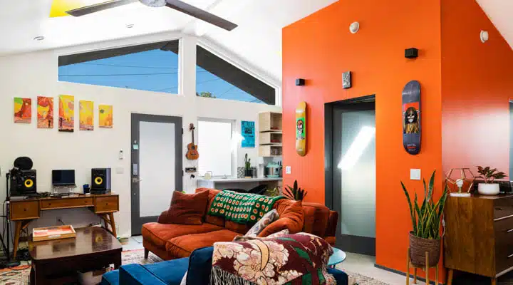 A living room filled with furniture and a tv