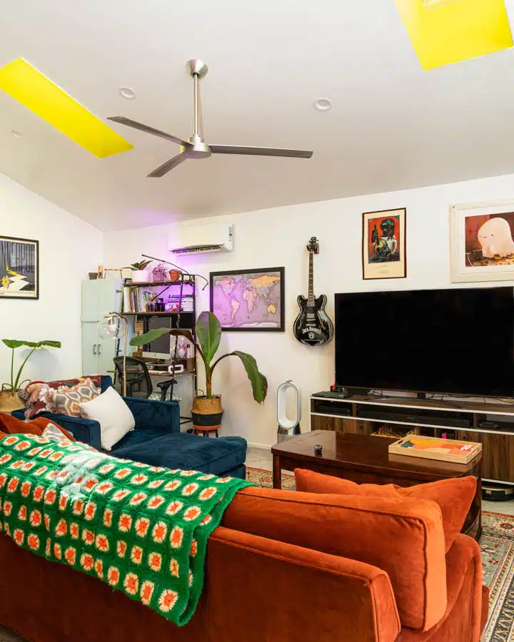 A living room filled with furniture and a flat screen tv