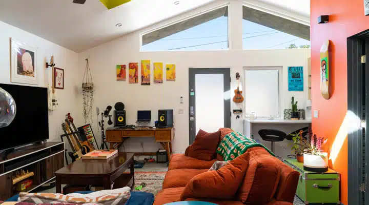 A living room filled with furniture and a tv