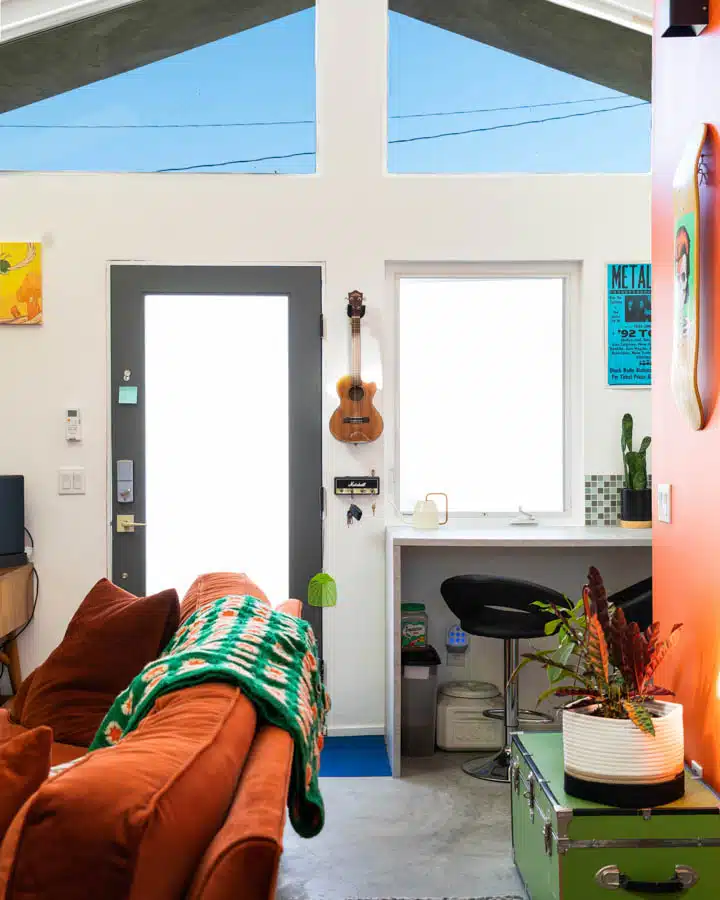 A living room filled with furniture and a flat screen tv