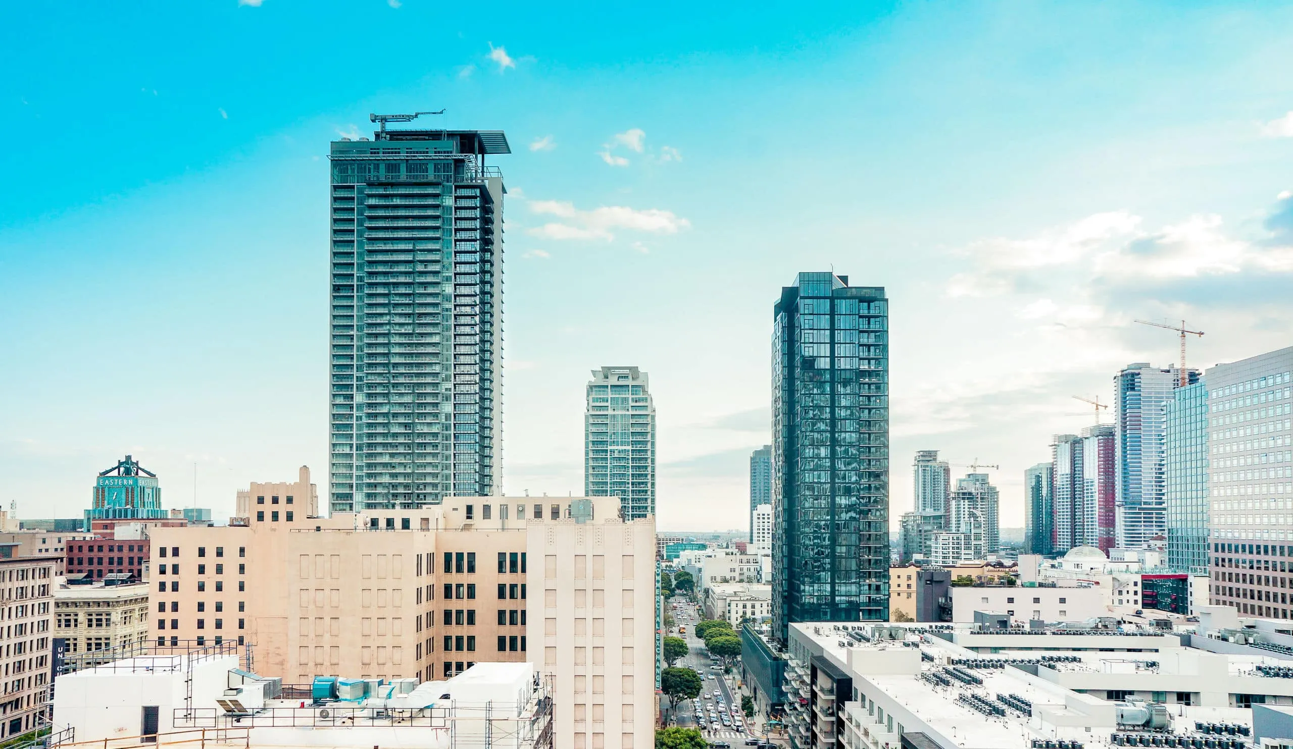 A large city with tall buildings in the background