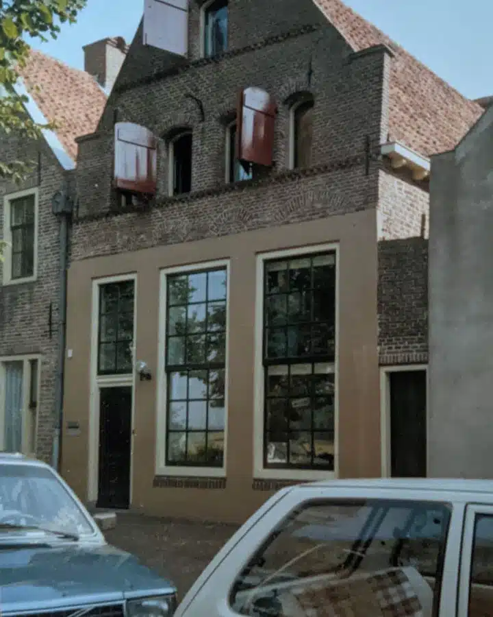 A car parked in front of a building