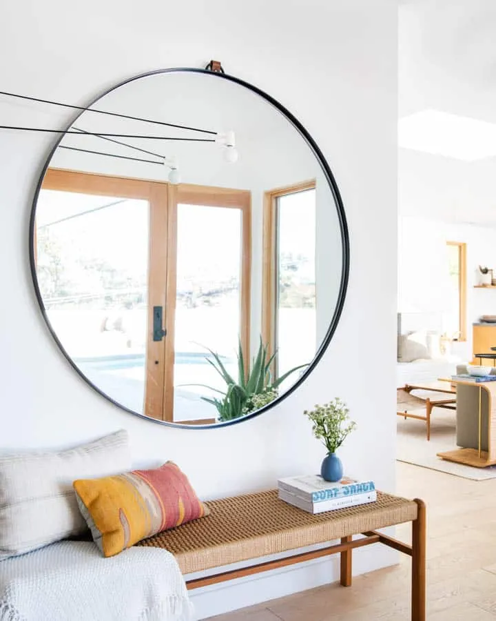 A living room filled with furniture and a large window