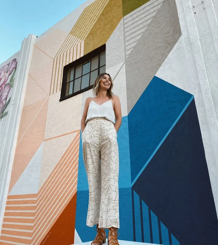 A person standing in front of a building