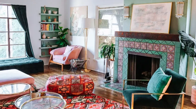 A living room filled with furniture and a fire place