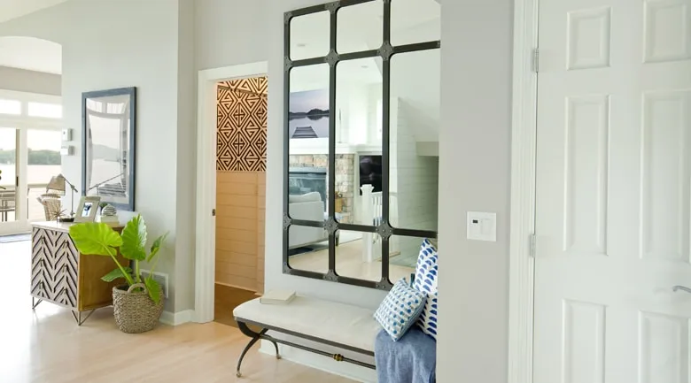 A living room filled with furniture and a large window