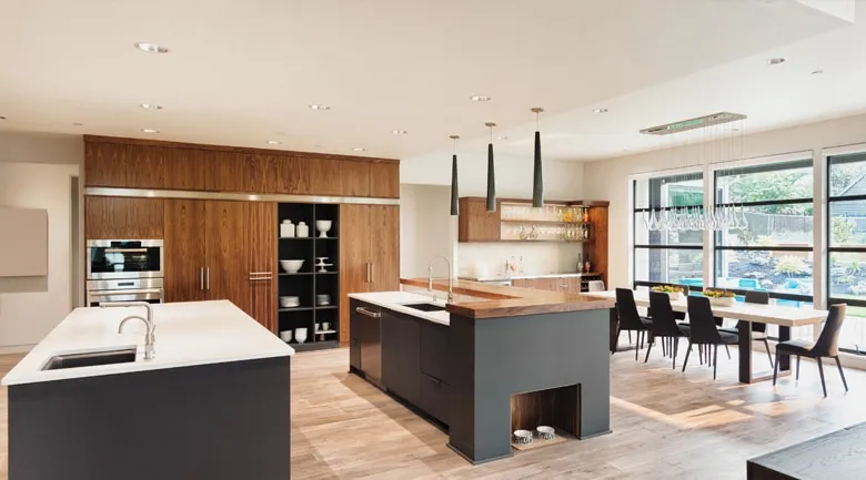 A kitchen with an island in the middle of a room