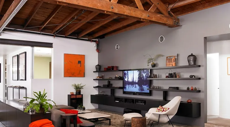 A living room filled with furniture and a flat screen tv