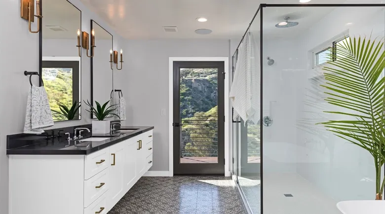 A living room with a sink and a window