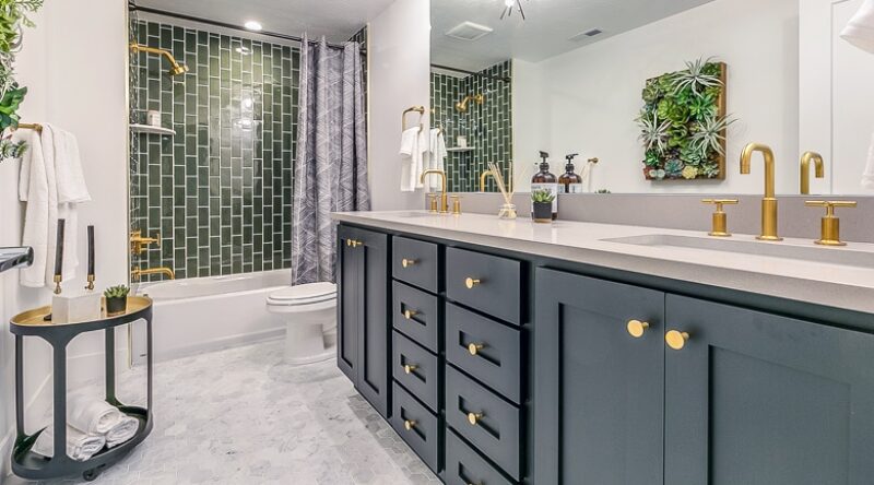 A kitchen with a sink and a window