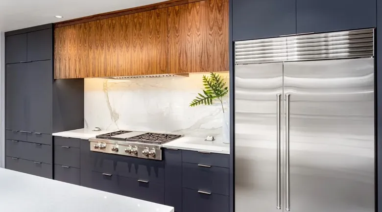 A stainless steel refrigerator in a kitchen