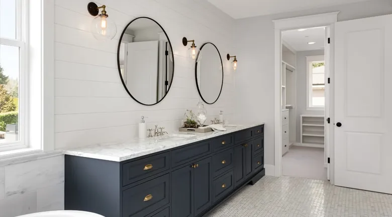 A kitchen with a sink and a window