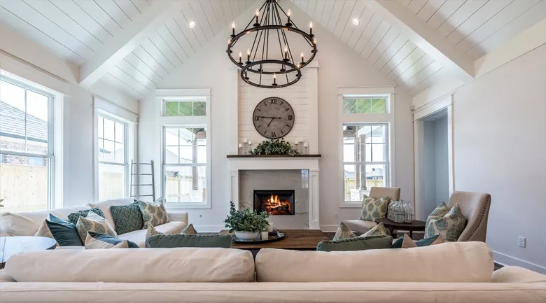 A living room filled with furniture and a large window