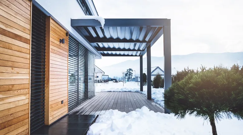 A building with snow on the ground