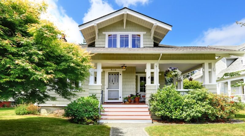 A large lawn in front of a house