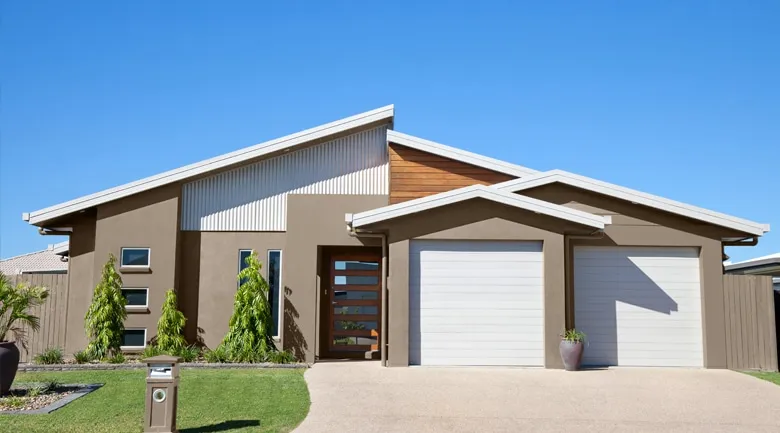 A house with trees in the background