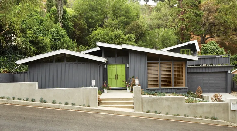 A house with trees in the background