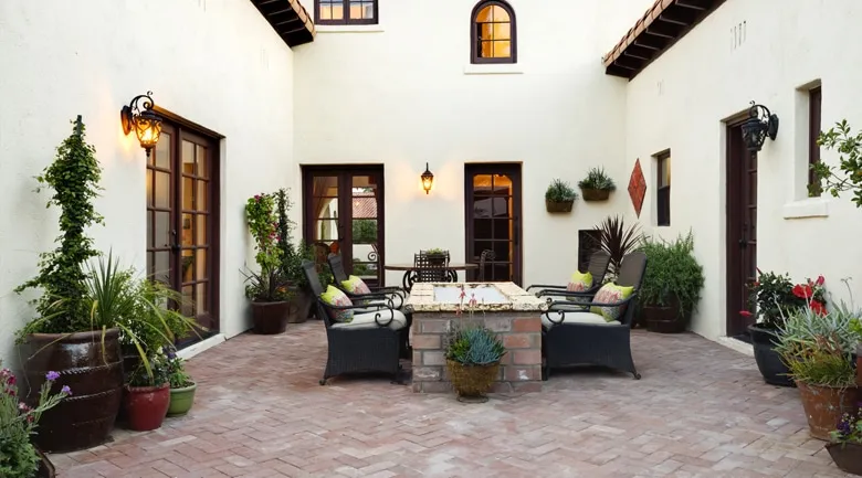 A living room filled with furniture and a fire place