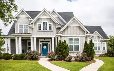 A large lawn in front of a house