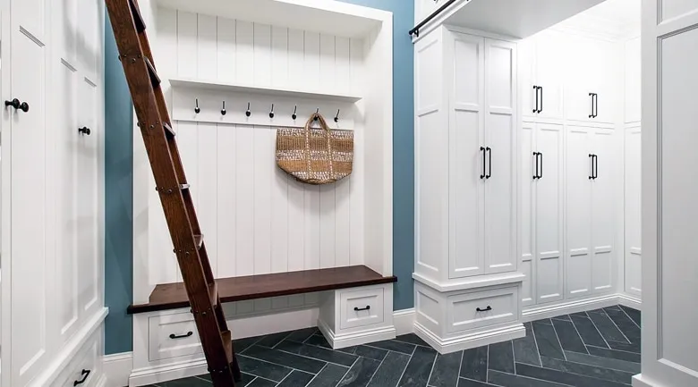 A kitchen with a wooden door