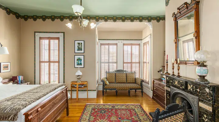 A living room filled with furniture and a large window