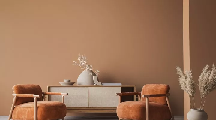 A living room filled with furniture and vase on a table