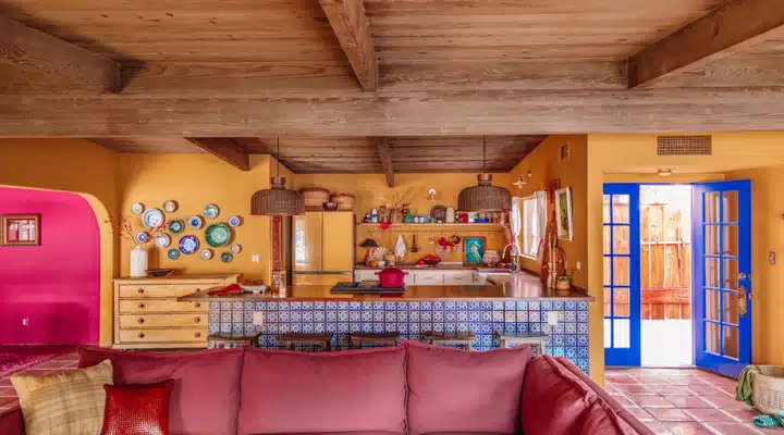 A living room filled with furniture and a fire place