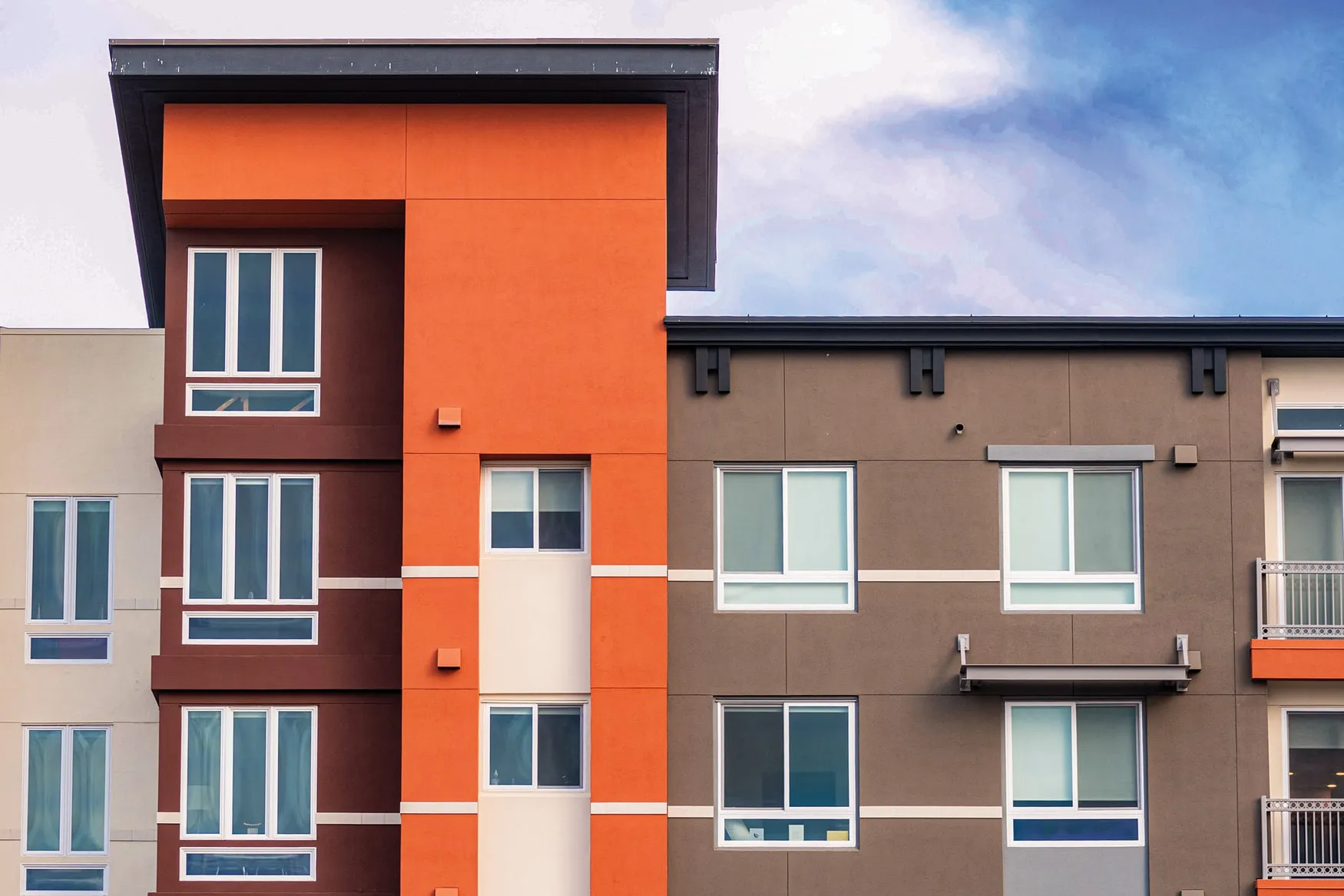 A person standing in front of a building