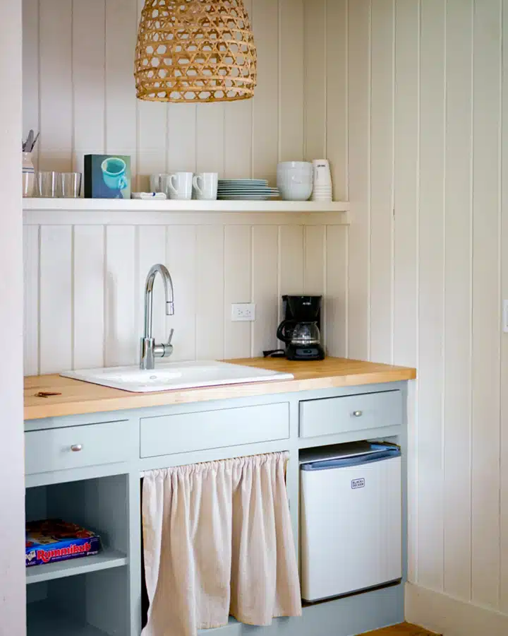 A kitchen with a stove and a sink