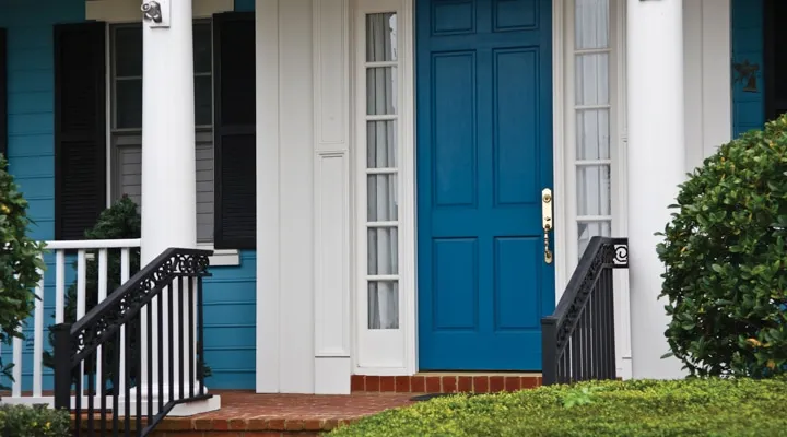 A bench in front of a house