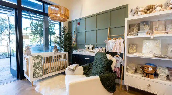 A living room filled with furniture and a large window