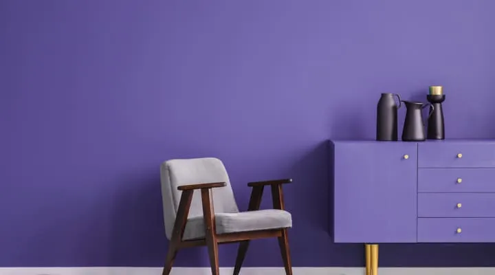 A room filled with furniture and vase on a table