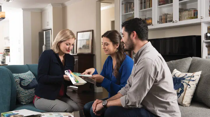 Three Persons In A Dunn-Edwards In-House Paint Color Session