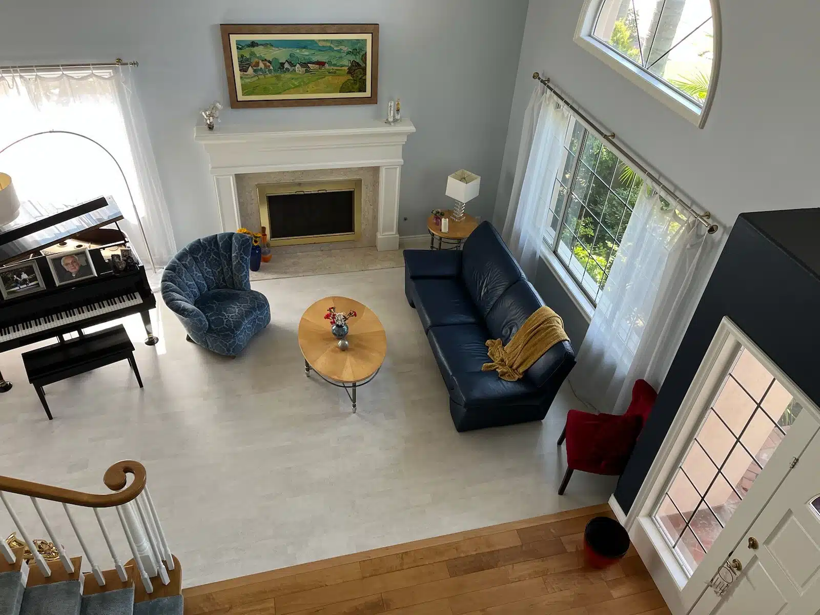 A living room filled with furniture and a fire place