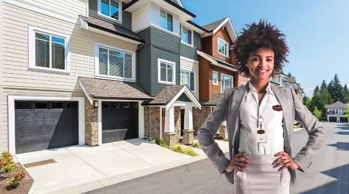 A woman standing in front of a building