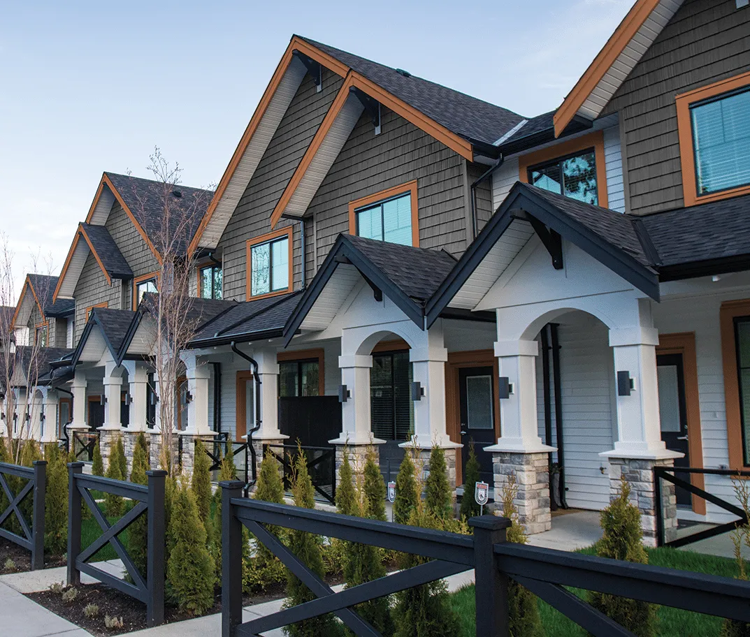 A house with a wooden fence