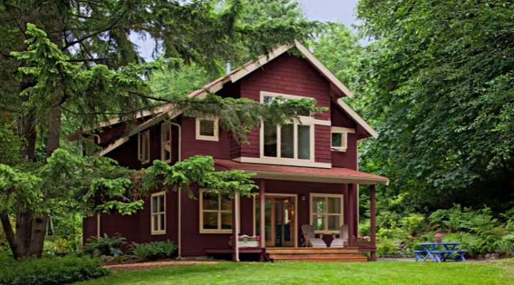 A house with trees in the background